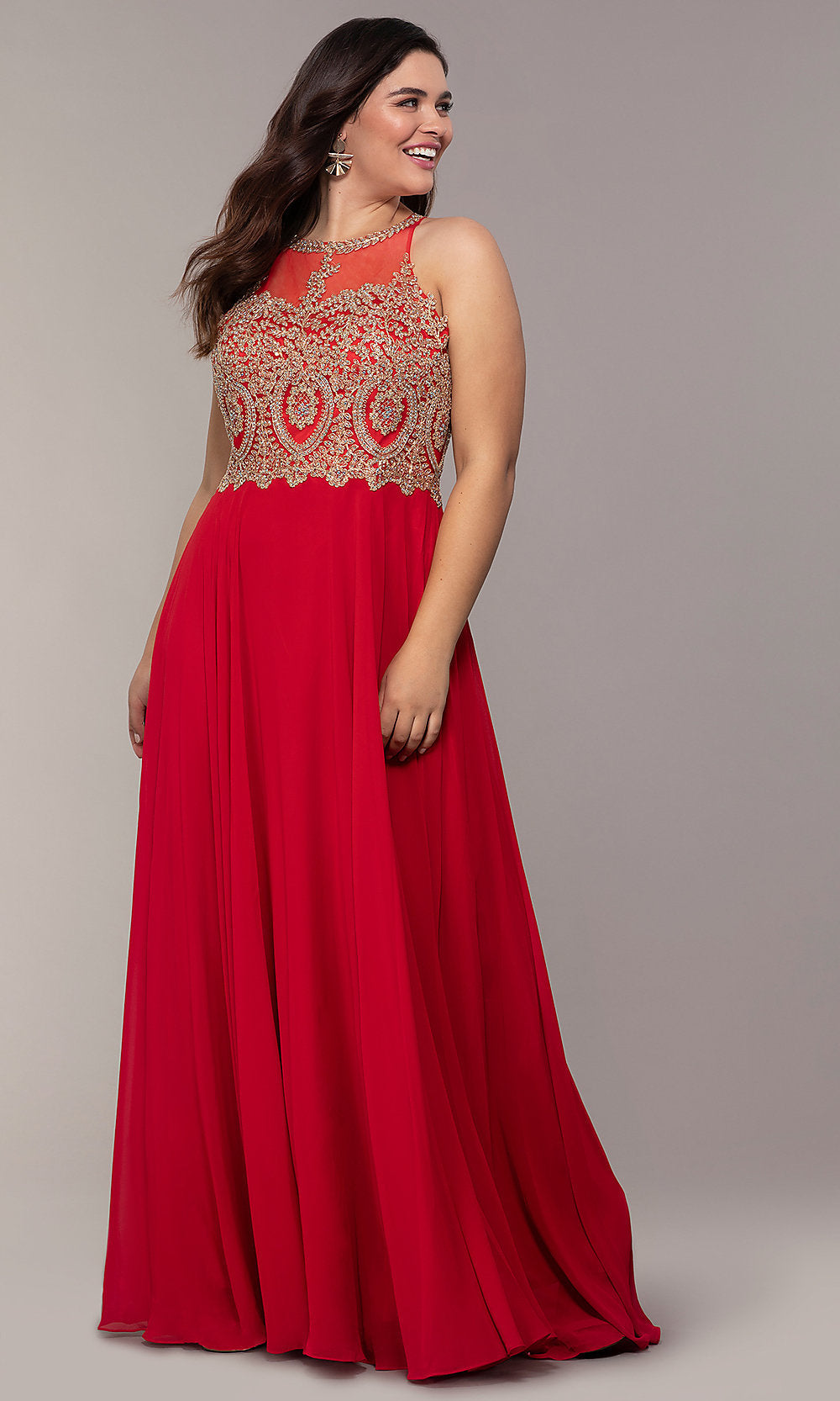 A woman stands against a plain background in a Long Chiffon Embroidered-Bodice Prom Dress featuring a sleeveless design and intricate gold details on the bodice.